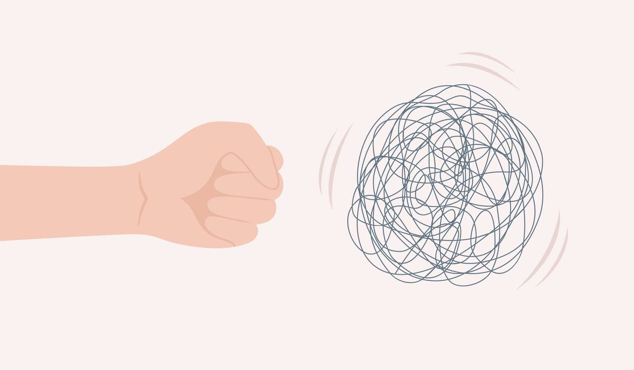 An illustration of a clenched hand striking a tangled ball of string, symbolising anger and inner tension in the fight response.