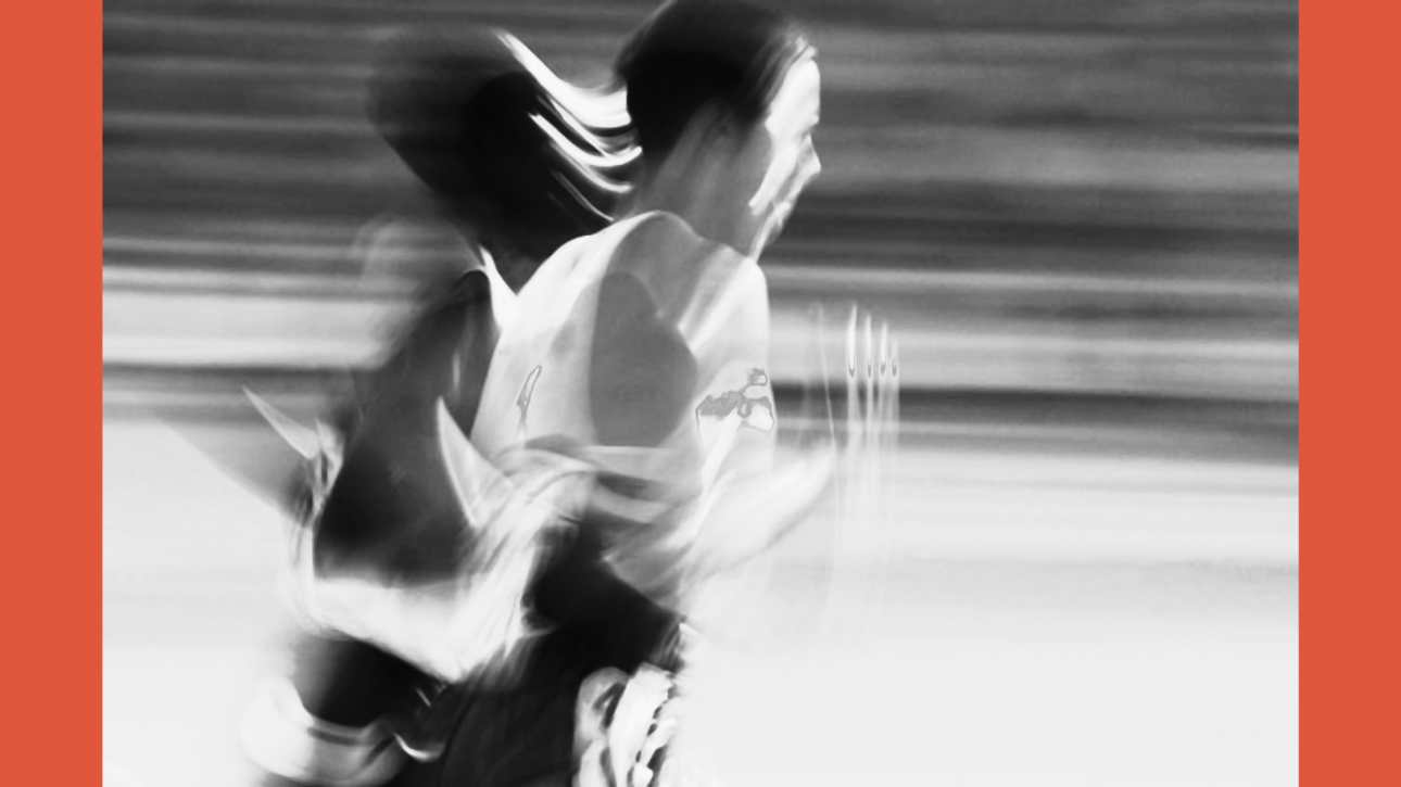 A blurred image of a woman running in athletic gear, symbolising the body’s instinct to flee from perceived danger.