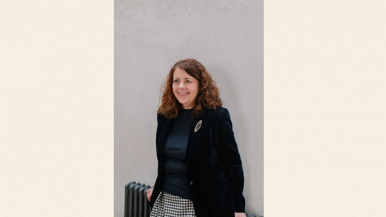 Karen Toms, therapist and counsellor, smiling warmly, reflecting the role of humour and lightness in therapy