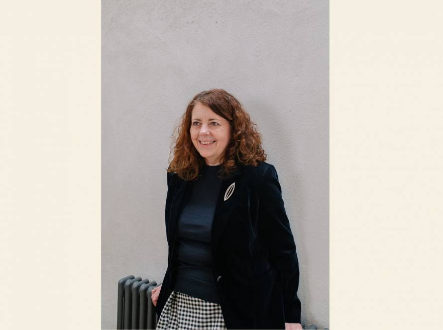 Karen Toms, therapist and counsellor, smiling warmly, reflecting the role of humour and lightness in therapy