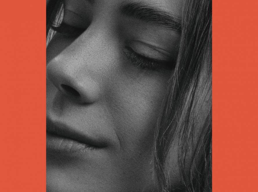 Close up black and white portrait of a woman with eyes closed — self-awareness as a double-edged gift, by Karen Toms therapist and counsellor