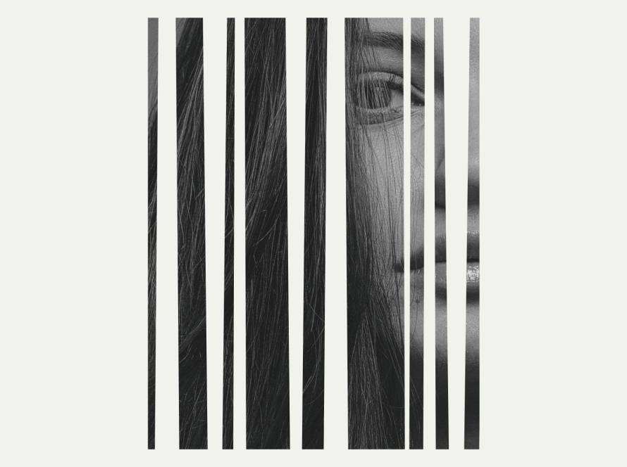 Fragmented black and white portrait, a woman's face and hair broken into vertical strips, evoking the disorientation of gaslighting